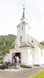The white wooden Bjørke church.